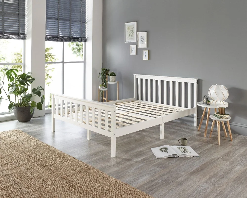 White wooden deals bed with mattress